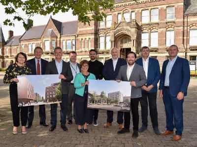 Council Leader Councillor David Baines, Cabinet Member for Regeneration Councillor Richard McCauley, Council Chief Executive Kath O'Dwyer and officers and representatives from the council, ECF and Vinci outside St Helens Town Hall 