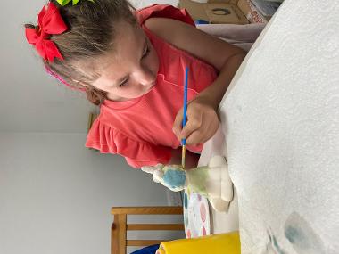 Children and young people enjoying Pottery Painting sessions