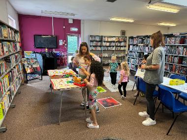 Children, young people and their families enjoying SEND Summertime Play Sessions