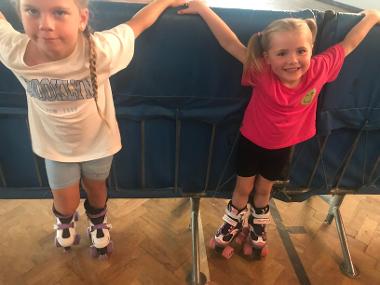 Families enjoying an afternoon of  roller skating